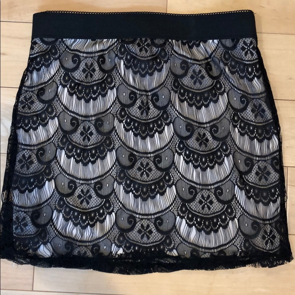 Black lace mini skirt